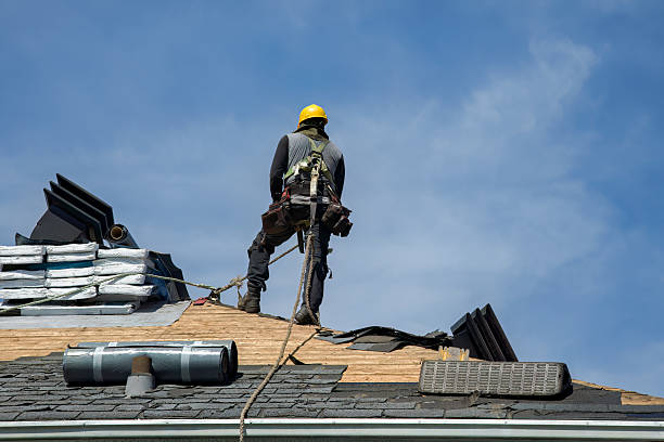 Professional Roof Replacement technician working in East Providence, RI